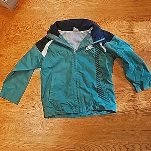 Green and blue Nike coat
